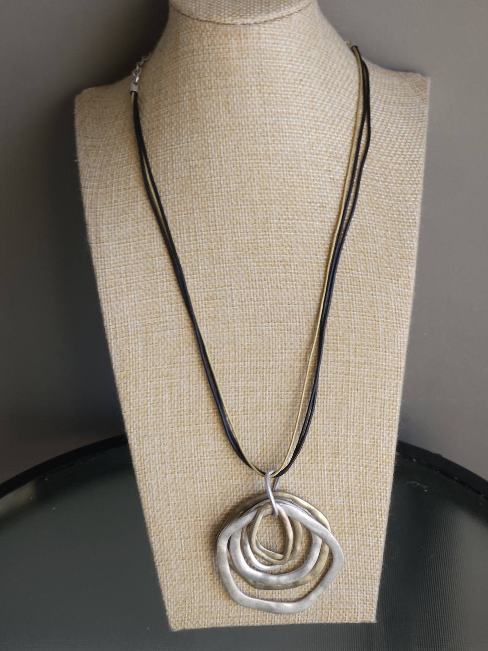 Silver, Gold Tone Multi-Ring Pendant Necklace on Black Cord - Unbranded